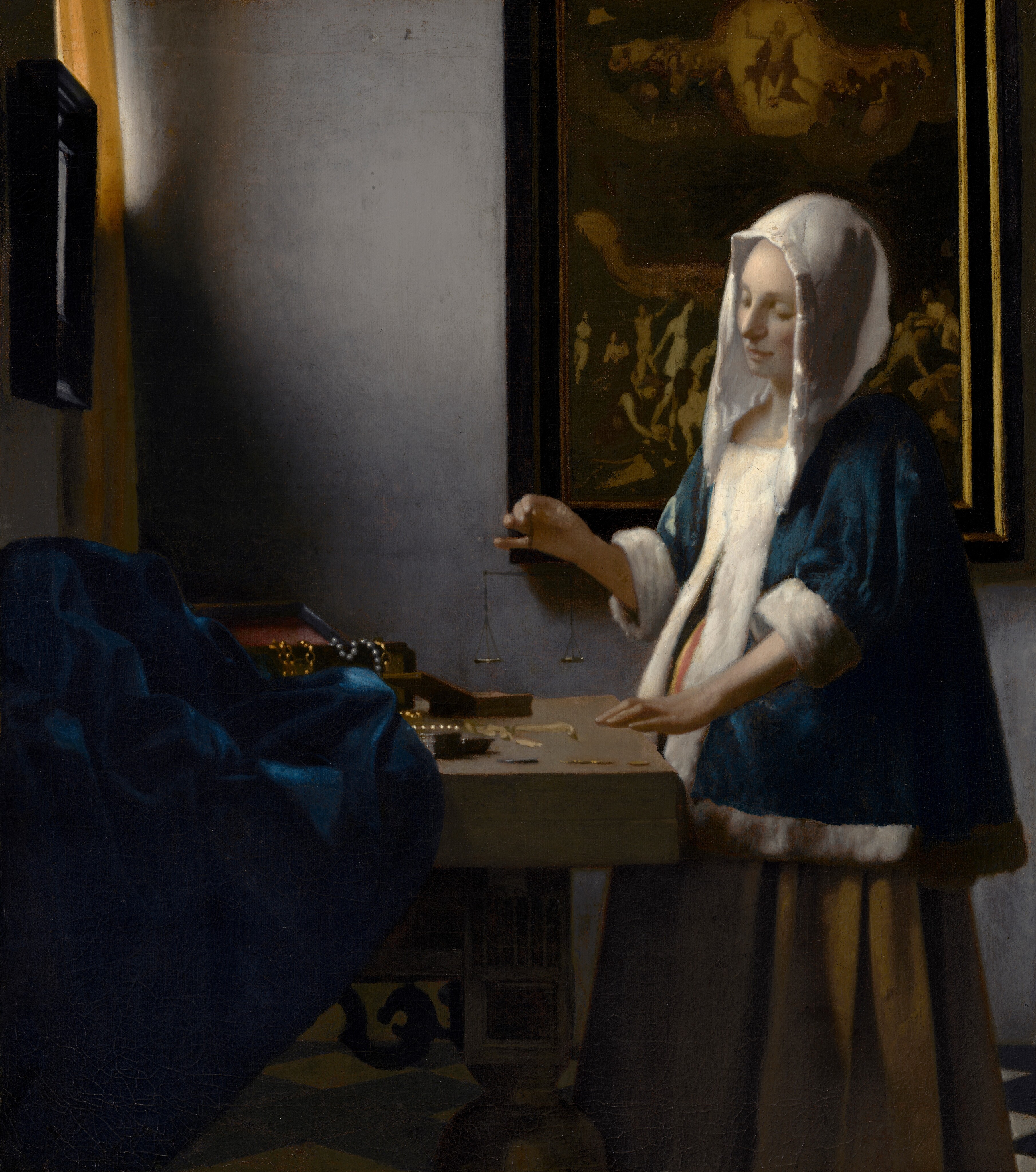 Woman Holding a Balance - Johannes Vermeer